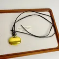 Korean long gold locket pendant necklace with brown leather cord, minimalist design detail. - Box Necklace (Z-3088) / Gold
