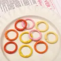 Anillos redondos de metal pintado de colores en aleación para llaveros DIY y accesorios de bolsos. - Serie Naranja y Amarillo