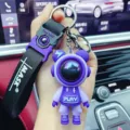 Trendy epoxy astronaut bear keychain pendant, cute car key ring charm for men and women gift - Play Lightning Bear Purple