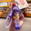 Süßer lila farbener Kaninchen Schlüsselanhänger mit Silikonband für Taschen und Rucksäcke. - Lila