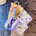 Mini Rubik's cube keychain with cute cartoon dog pendant, purple strap and bell keyring. - Rabbit Style / OPP Bag / Purple