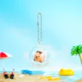 Süßer Wasserschwein Schlüsselanhänger im transparenten Kapselspielzeug, Mini Anhänger Geschenk. - Schwimmring-Stil