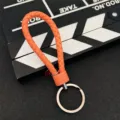 Orange geflochtene Leder-Schlüsselanhänger mit Metallring, stilvolle Auto-Schlüsselkette Tasche. - Orange
