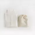 White ribbed turtleneck thermal underwear top with matching canvas drawstring storage pouch - One Size / Cream