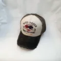 Close-up detail shot of vintage washed baseball cap with retro football text print. - 55-59 / Black