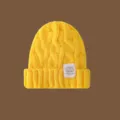 Gorro de punto amarillo de invierno gorro cálido de punto trenzado para mujer y hombre. - Amarillo