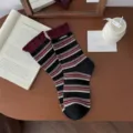 Women's retro striped cotton mid-tube socks with rolled cuffs and brand fabric label for autumn. - Black Base - Red Opening - Letter Cloth Label