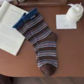 Vintage striped cotton crew socks for women, comfortable rolled cuff design with stylish logo tag. - Coffee Base - Dark Blue Opening - Letter Cloth Label