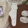 White ballet stirrup leg warmers for women, sweet hollow bow summer thin slouch socks. - White