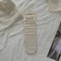 Cute beige mid-calf slouch socks for women, featuring a sweet polka dot bow knot design. - One Size / Pearl White - Floral Bow