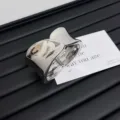 Close-up of minimalist silver geometric hinge bangle, glossy finish alloy fashion bracelet. - Style B Shiny / Silver