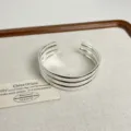 Silver multi-strand open cuff bracelet, shiny polished finish, minimalist European style. - Multi-layer Open Bangle (Y-206)