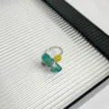 Close-up detail of handcrafted gemstone ring, featuring raw crystal and bead design. - Style A (X-455)