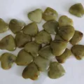 Small natural green jade heart-shaped polished stones for home decoration and gifts - Xiu Jade