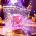 Μωβ λαμπερό τετράγωνο παιχνίδι squishy με σχέδια ματιών σε σακούλα, θέμα Halloween - Στυλ Παγοκύβου Ροζ Αράχνη Halloween (4.5cm) / Ροζ