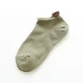Women's low-cut boat socks in heather green with contrast brown heel tab, comfortable and breathable. - One Size / Bean Green