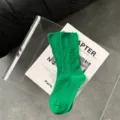 Women green distressed slouch socks, cotton casual knitted crew socks with ripped design for autumn. - One Size / Green