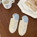 Comfortable women's shallow cut socks with cute colorful speckles and blue heel design. - One Size / Sky Blue Heel