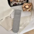 Grey ribbed mid tube socks for women, cozy knit long socks, casual autumn footwear style. - Light Gray