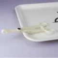 White plastic body piercing clamp tool for safe and easy piercing procedures accessory - Disposable Round Open Forceps