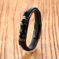 Close-up view of the black braided leather bracelet featuring metal bamboo beads and magnetic clasp. - 19cm / Black Agate