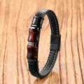 Detail shot of vintage men leather bracelet with black stainless steel clasp and red beads. - Red Tiger Eye
