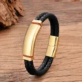 Close-up detail of the men's black braided leather bracelet featuring a smooth gold metal plate. - 19cm / Gold