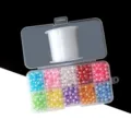 Acrylic bead and elastic string DIY material kit detail showing colorful loose beads in box. - Colorful Round Pearls, 600 Pieces / No Rhinestone Box or Fishing Line
