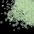 Glow in the dark hollow star sequins for nail art DIY resin crafts and makeup decoration. - 15g Bag / Light Green