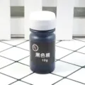 Detailed view of 10g black epoxy resin color essence, professional oily dye pigment for UV glue. - Black