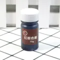 Detailed view of the 10g reddish brown pigment bottle, perfect for resin craft coloring. - Red Brown