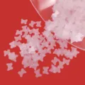 Matte translucent butterfly sequins for DIY crafts, resin filling, and nail art decoration. - Pink