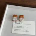 Detailed shot of retro wooden square earrings with exquisite crystal flower cluster studs. - Wood Crystal Flower Style (EH3157)