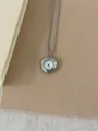 Vintage silver heart-shaped pocket watch pendant necklace, delicate detailed product view. - Heart Pocket Watch Style (XL5348B)