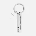 Stainless steel cross keychain detail, featuring an engraved inspiring text bar and a mini cross. - Scripture 19:18 / Ziplock Bag Packaging