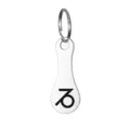 Stainless steel Capricorn zodiac sign keychain token accessory close-up detail shot. - Capricorn Token