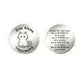Detail view of a stainless steel pocket hug coin featuring a cute cat and German quotes. - Cat German Coin