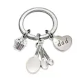 Dad alloy keychain detail featuring cute cupcake and measuring spoons for parent gift. - DOG DAD