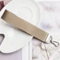 Khaki Webbing Wrist Strap Keychain Featuring Durable Silver Metal Hardware Variant - Coffee Ribbon (Silver Buckle)
