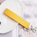 Yellow webbing keychain with silver hardware strap accessory for bags and car keys daily. - Yellow Ribbon (Silver Buckle)