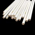 White nail art dotting pen detail showing wooden core and golden print body for DIY crafts. - White