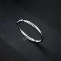 Bague ultra-fine minimaliste en acier titane argenté avec petite pierre vue de détail - Taille 5 / Strass Unique / Acier