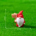 Miniature resin garden gnome figurine with lucky sign, cute micro landscape DIY decor accessory. - Gnome Holding Sign / Red Gnome with Sign