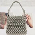Borsa a mano in perline metalliche argentate, mini borsa intrecciata chic stile francese estate. - Argento