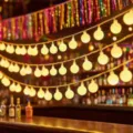 Detail view of LED globe string lights, warm white bulbs for cozy indoor outdoor decor. - 1.5m 10LED Battery / Warm Tone