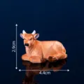 Mini resin cow figurine for micro landscape DIY desktop decor, length 4.4cm height 2.9cm. - Ox