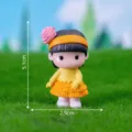Cute miniature resin girl figurine with orange headband and flower for desktop and car decor. - No. 5 Girl in Orange Dress