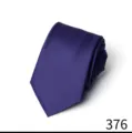 Close-up detail shot showing the fine texture and rolled form of a dark purple tie. - Deep purple