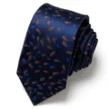Close-up detail of the dark blue jacquard necktie featuring elegant brown and blue leaf patterns. - Dark Blue