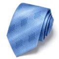Detailed view of a stylish blue jacquard pattern men tie, perfect for formal business wear. - Blue